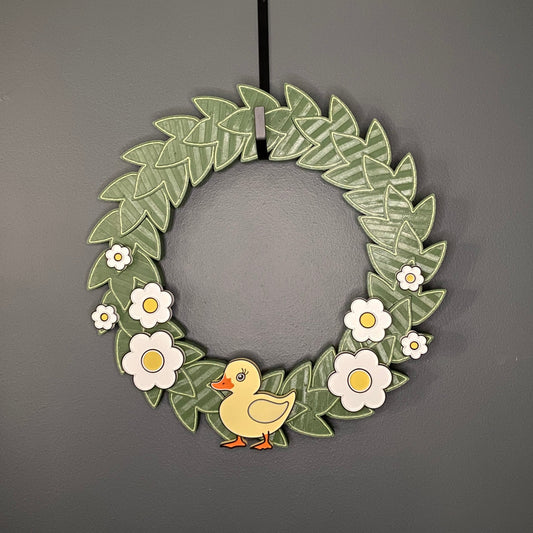 Medium Wreath White Flowers and One Yellow Duck Bundle